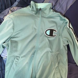 Turquoise champion zip-up jacket new with tags.